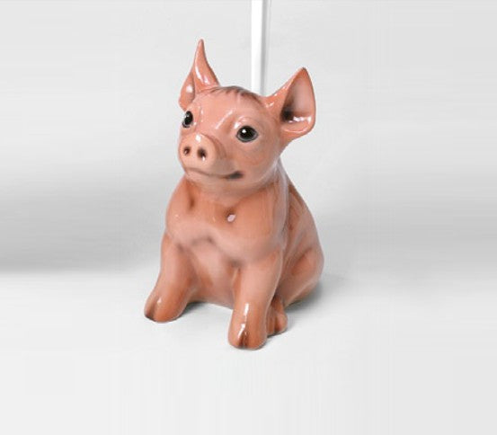 Grise Toiletbørsteholder - porcelænsfigur set fra en anden vinkel