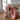 Plaid, Quilt Ethnic - fugl/pink fra EJA – draperet over sofa